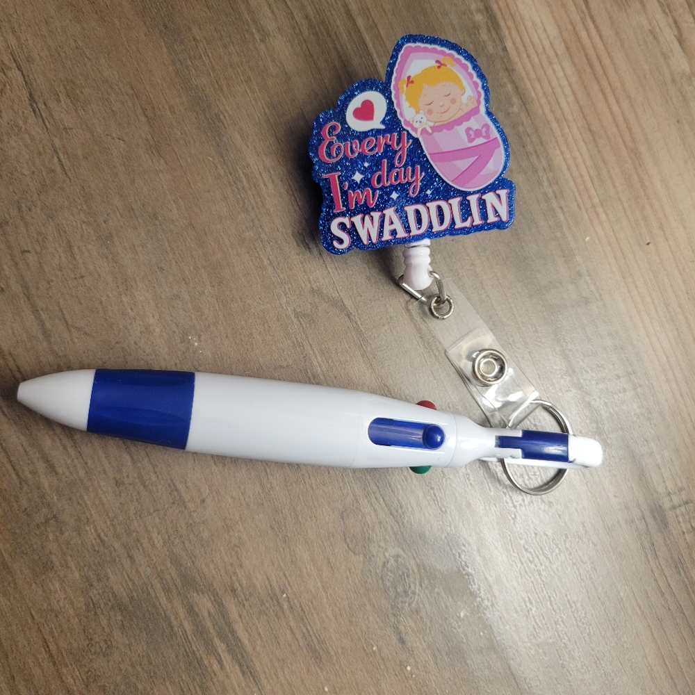 Nurse Badge and a multicolored pen